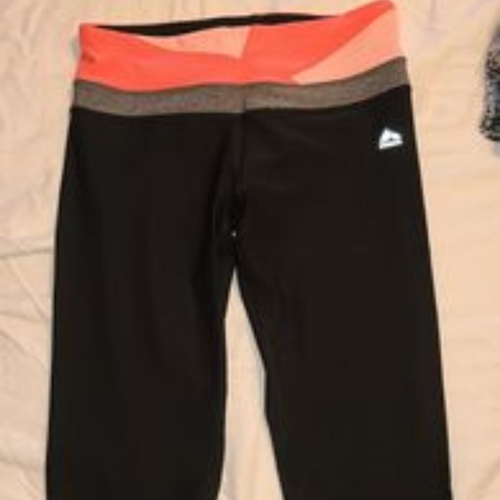 RBX size medium. Mid-rise and sits below the knee.